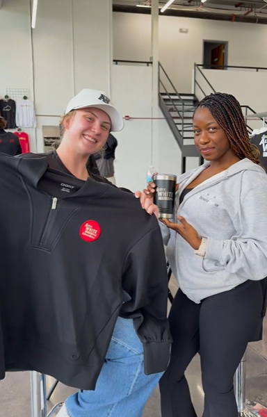 Guests with custom branded apparel and drinkware